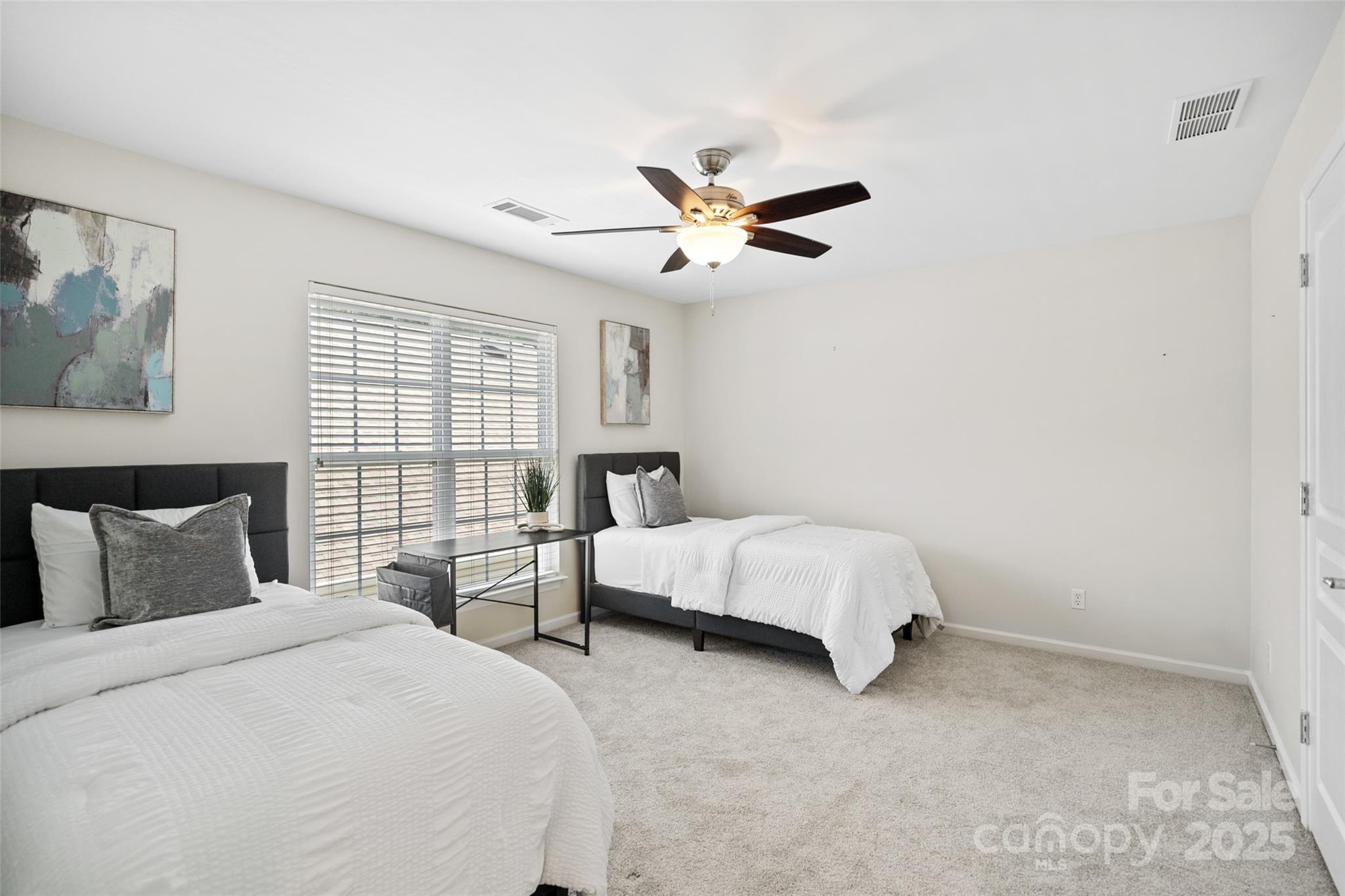 10471 Scotland Avenue Fort Mill, SC 29707 - Photo 11 of 20 a bedroom with two beds and window