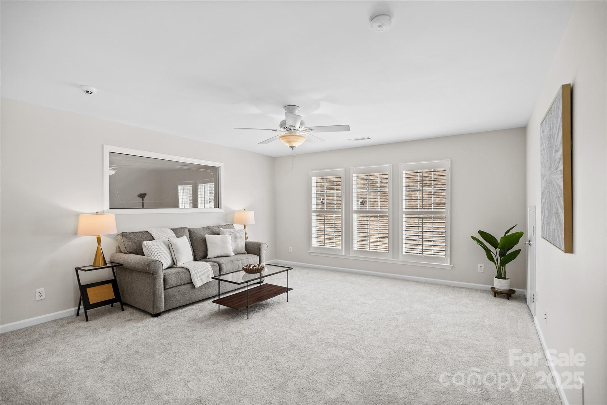 10471 Scotland Avenue Fort Mill, SC 29707 - Photo 12 of 20 a living room with furniture and a large window