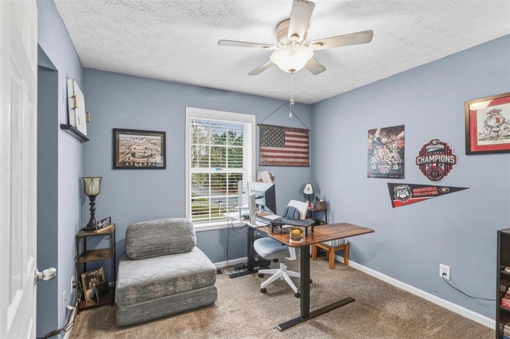 60 Sugar Birch Way Dallas, GA 30132 - Photo 14 of 31 a workspace with furniture and a window