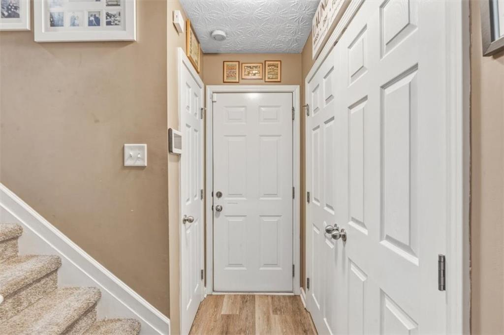 60 Sugar Birch Way Dallas, GA 30132 - Photo 15 of 31 a view of a hallway with wooden floor and entryway