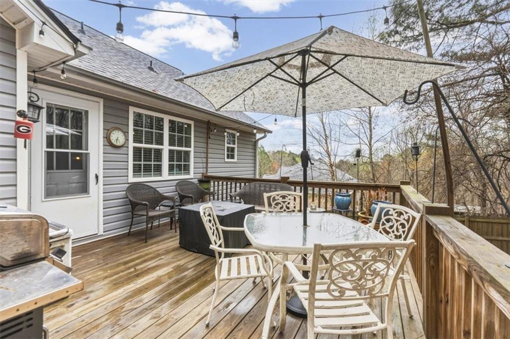 60 Sugar Birch Way Dallas, GA 30132 - Photo 19 of 31 a view of a chairs and table on the deck