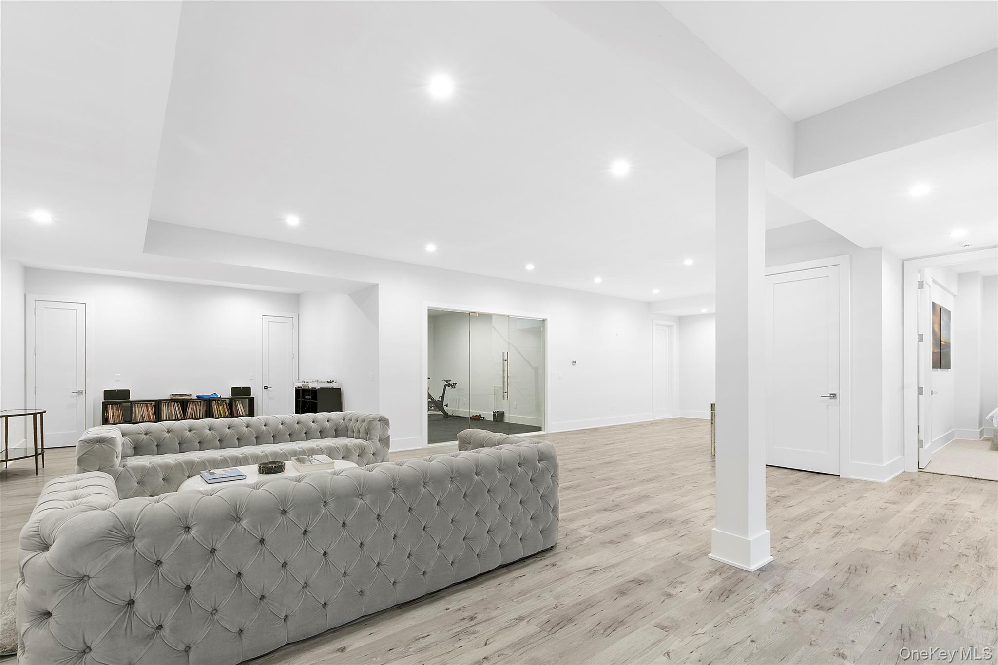 94 Merchants Path Sagaponack, NY 11962 - Photo 15 of 15 a large room with a lot of white furniture