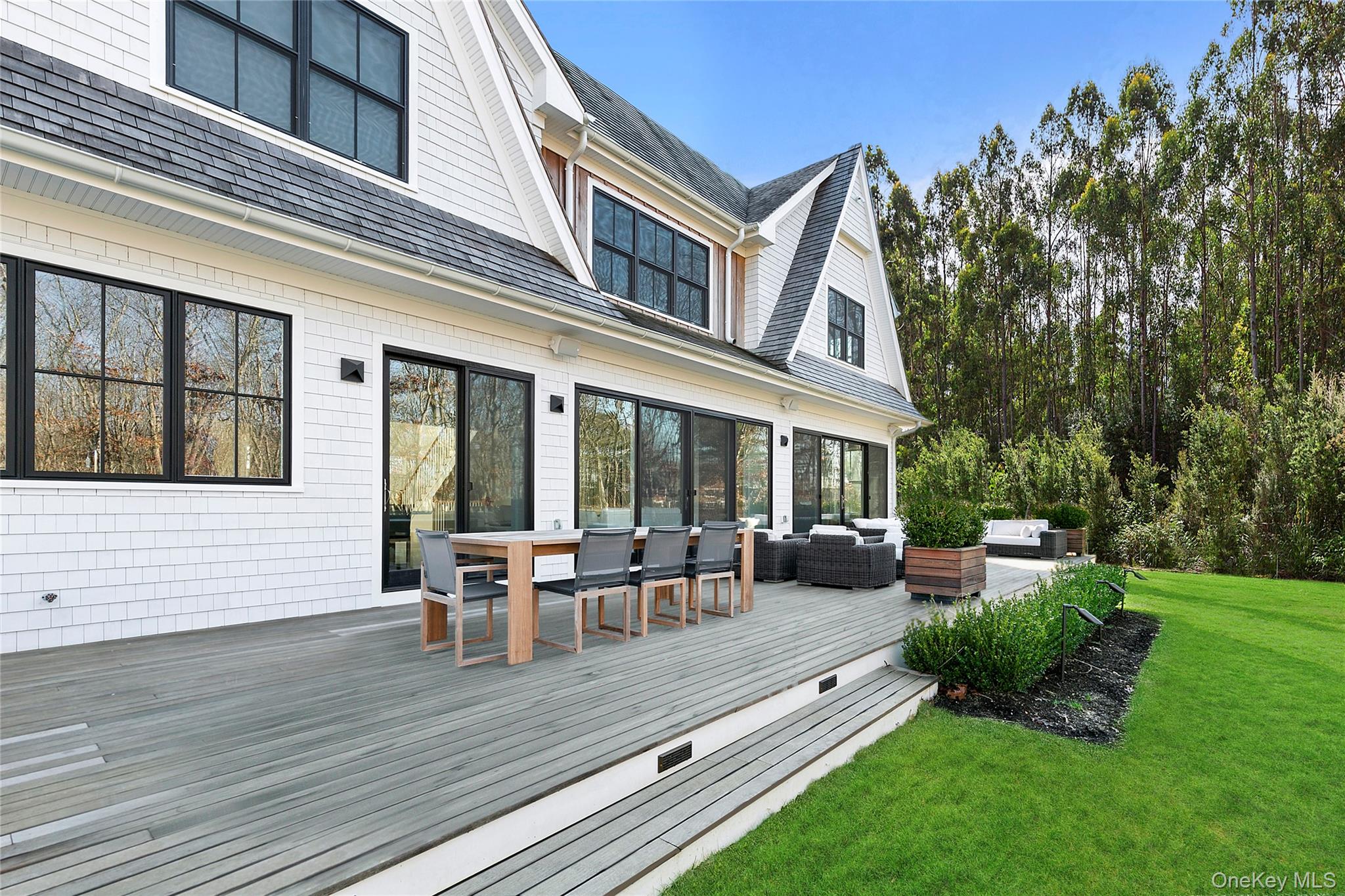 94 Merchants Path Sagaponack, NY 11962 - Photo 3 of 15 a view of a house with patio