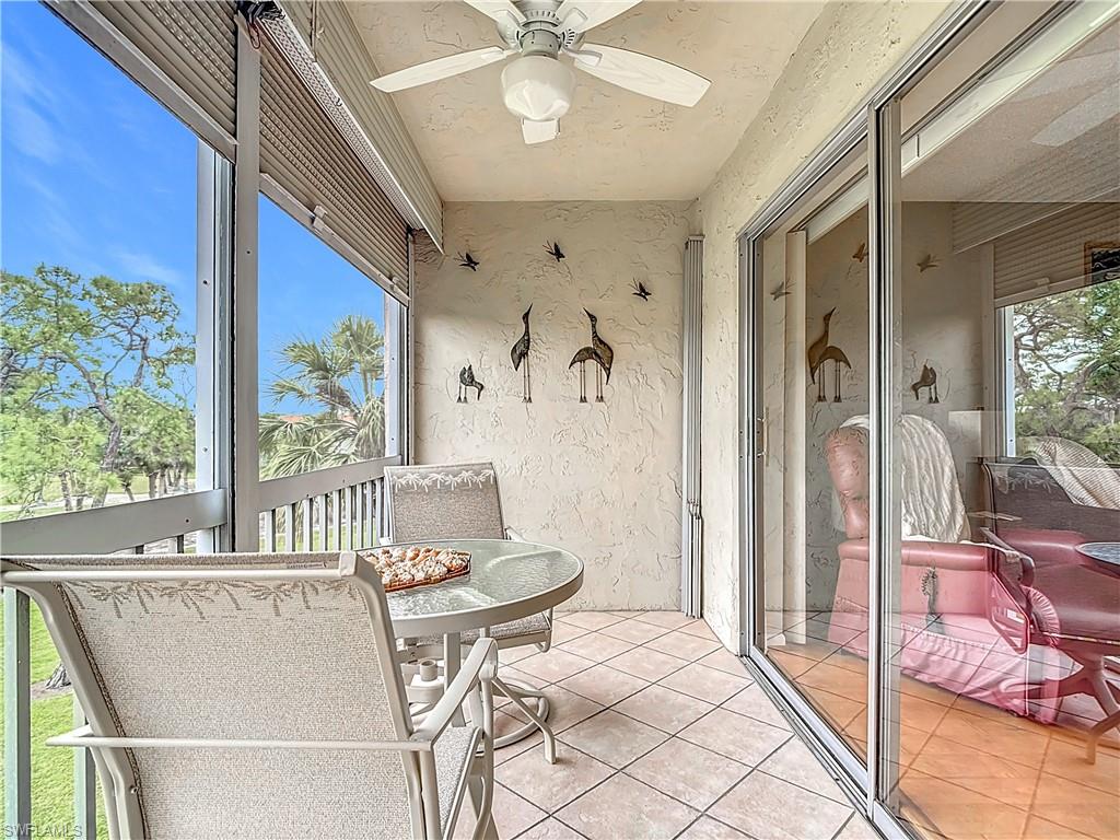 150 Turtle Lake Court, Unit 309 Naples, FL 34105 - Photo 30 of 42 Sunroom / solarium featuring a ceiling fan