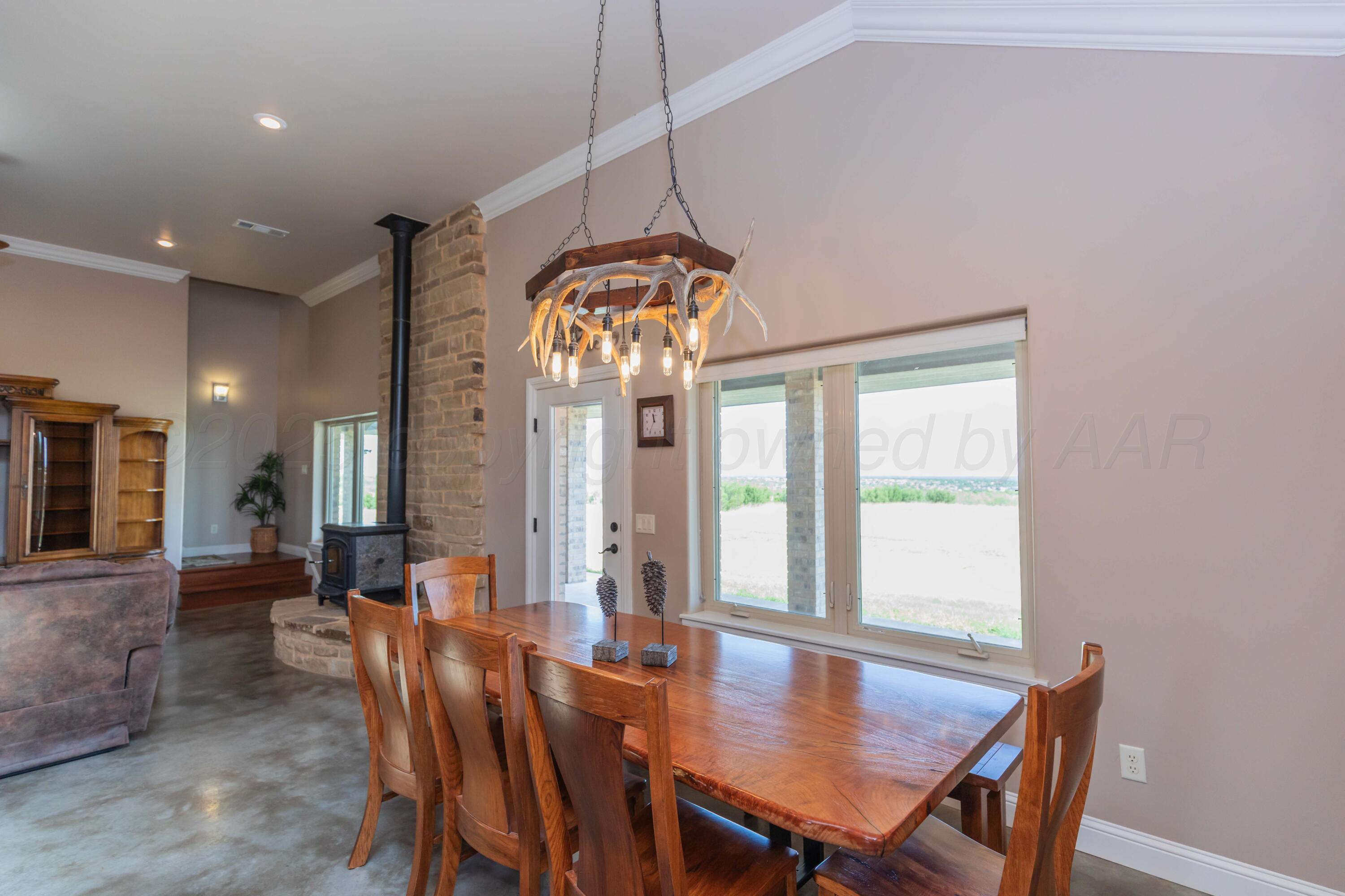 11400 Busan Way Canyon, TX 79015 - Photo 22 of 107 a dining room with furniture and window