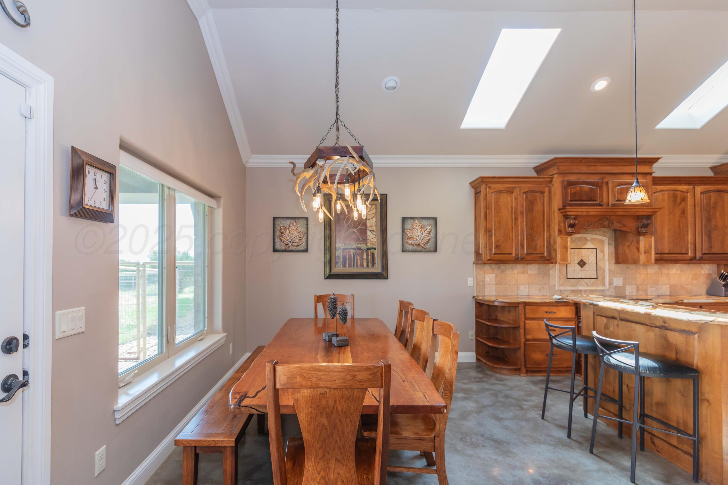 11400 Busan Way Canyon, TX 79015 - Photo 23 of 107 a view of a dining room with furniture window and outside view