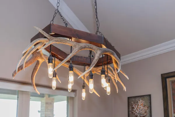 a bathroom with a granite countertop sink toilet a shower and a mirror