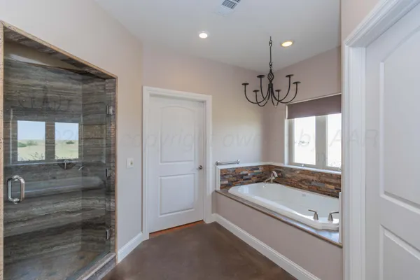 a kitchen that has a sink and cabinets