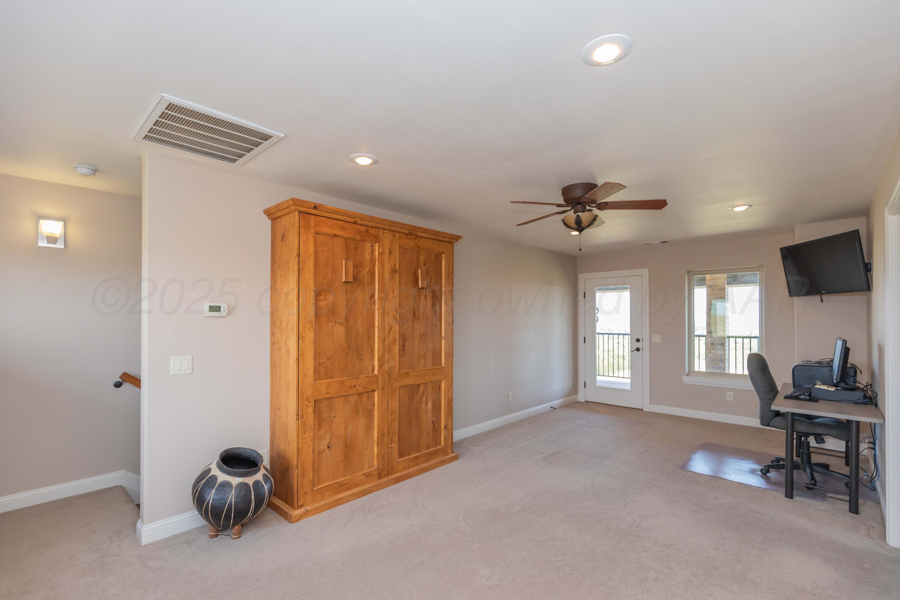11400 Busan Way Canyon, TX 79015 - Photo 46 of 107 a view of a livingroom with furniture and a ceiling fan