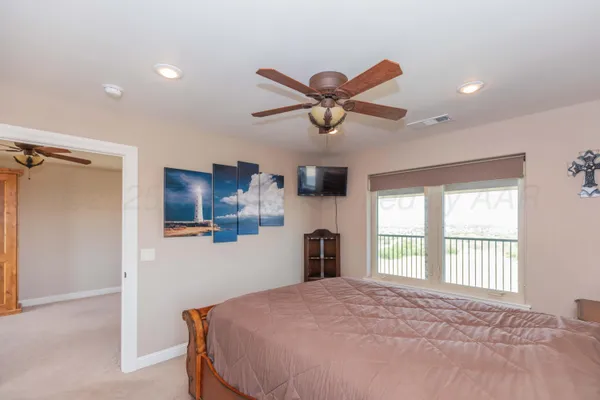 a bathroom with a shower and a sink