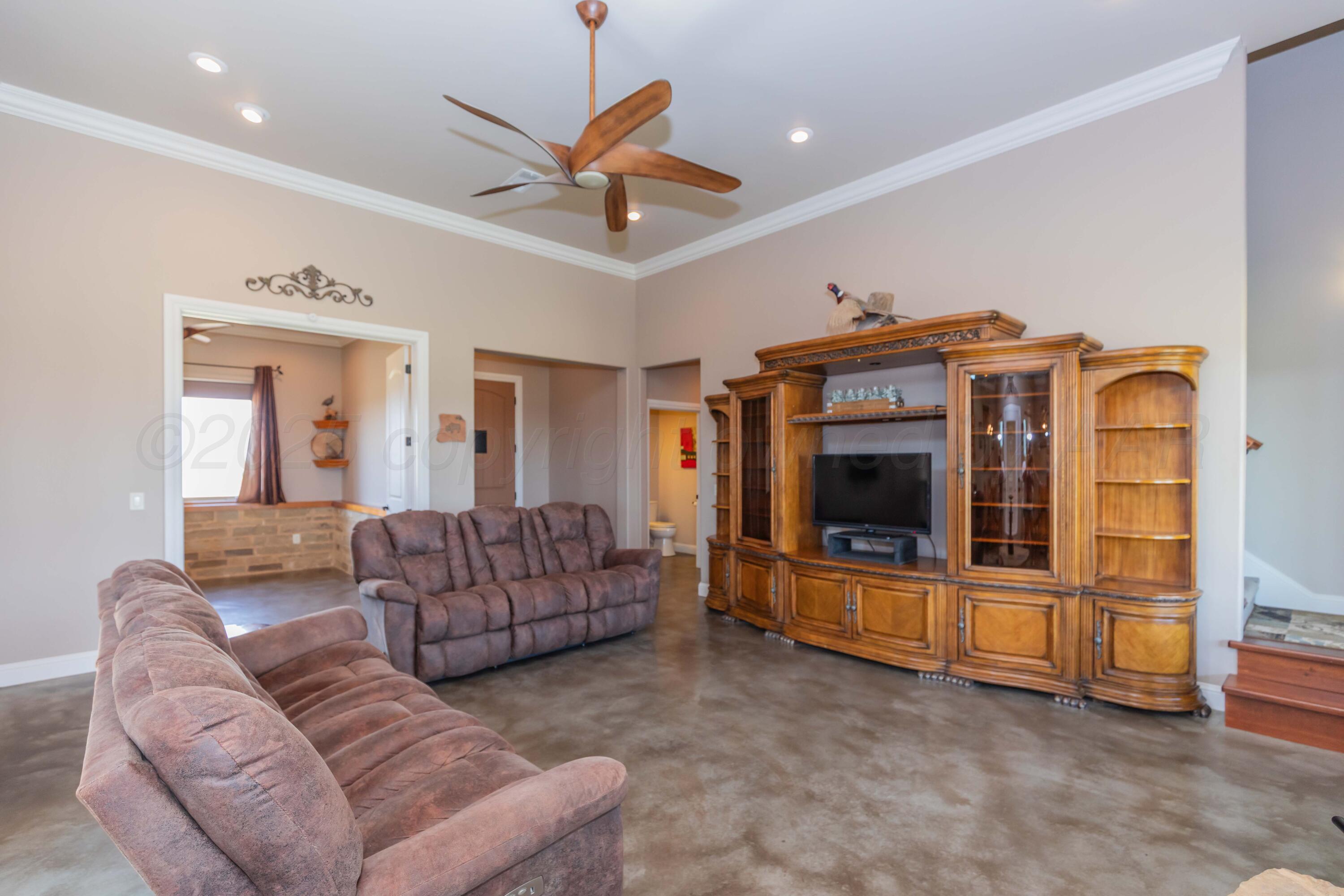 11400 Busan Way Canyon, TX 79015 - Photo 8 of 107 a living room with furniture and a flat screen tv