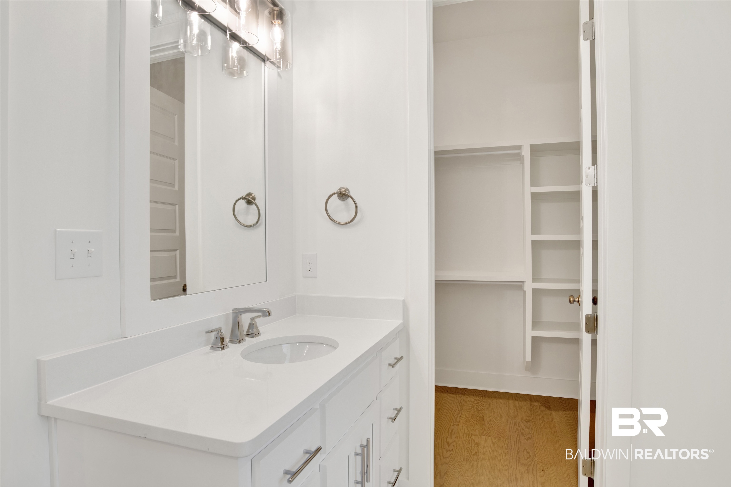 5 Long Leaf Circle Fairhope, AL 36532 - Photo 26 of 44 Bathroom with hardwood / wood-style floors and vanity