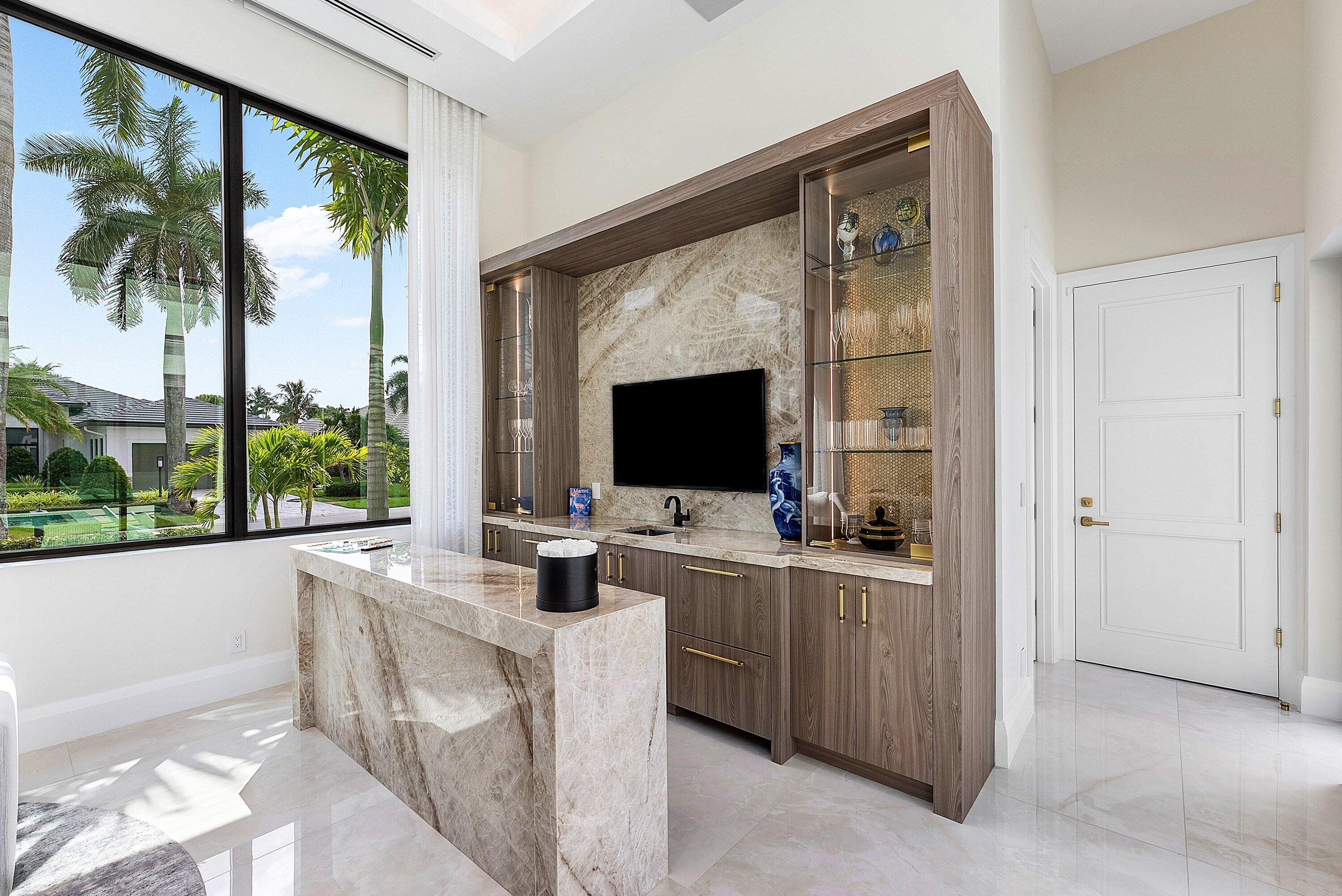 17615 Foxborough Lane Boca Raton, FL 33496 - Photo 11 of 120 a very nice looking room with a large window and a flat screen tv