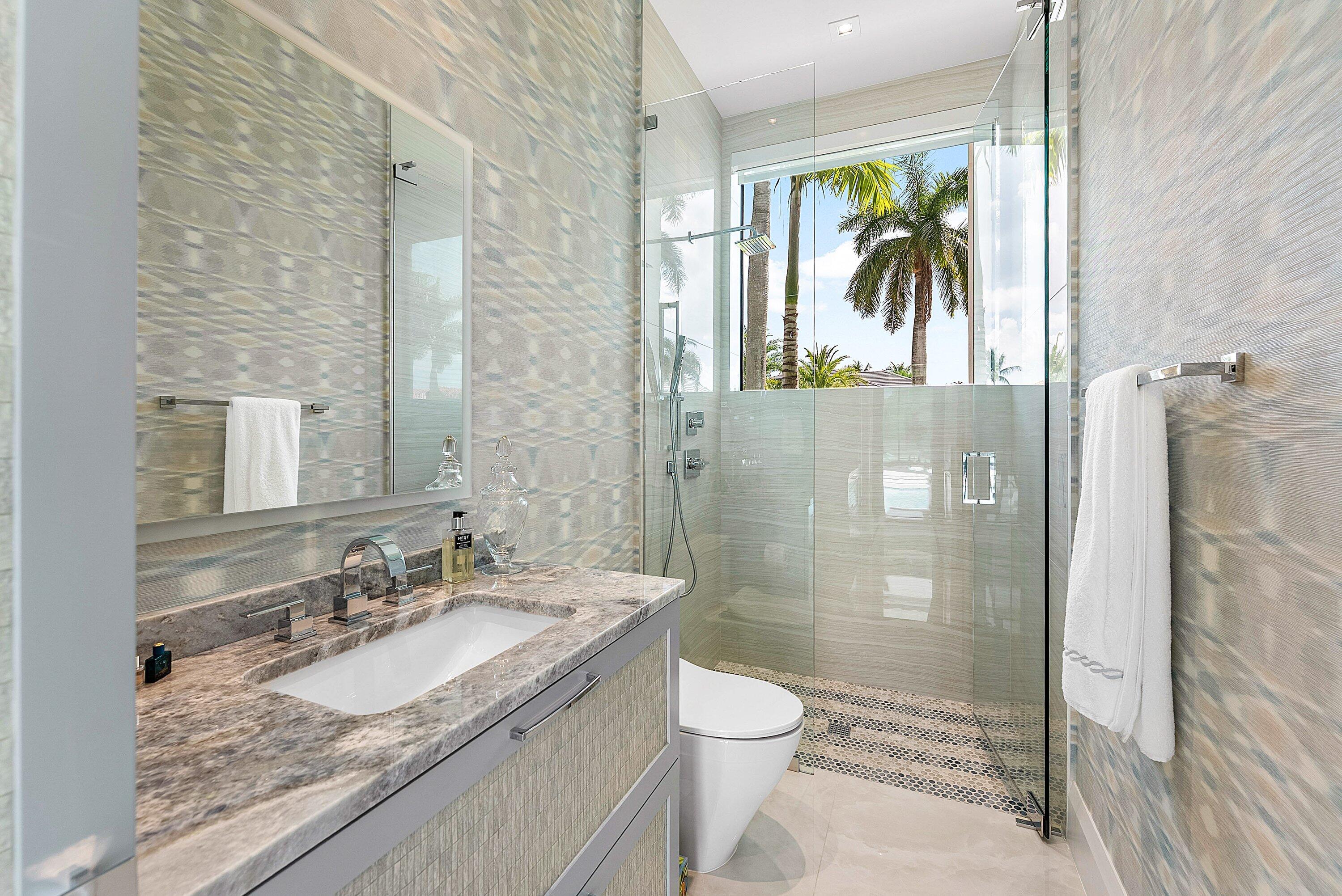 17615 Foxborough Lane Boca Raton, FL 33496 - Photo 12 of 120 a bathroom with a granite countertop sink a toilet and shower