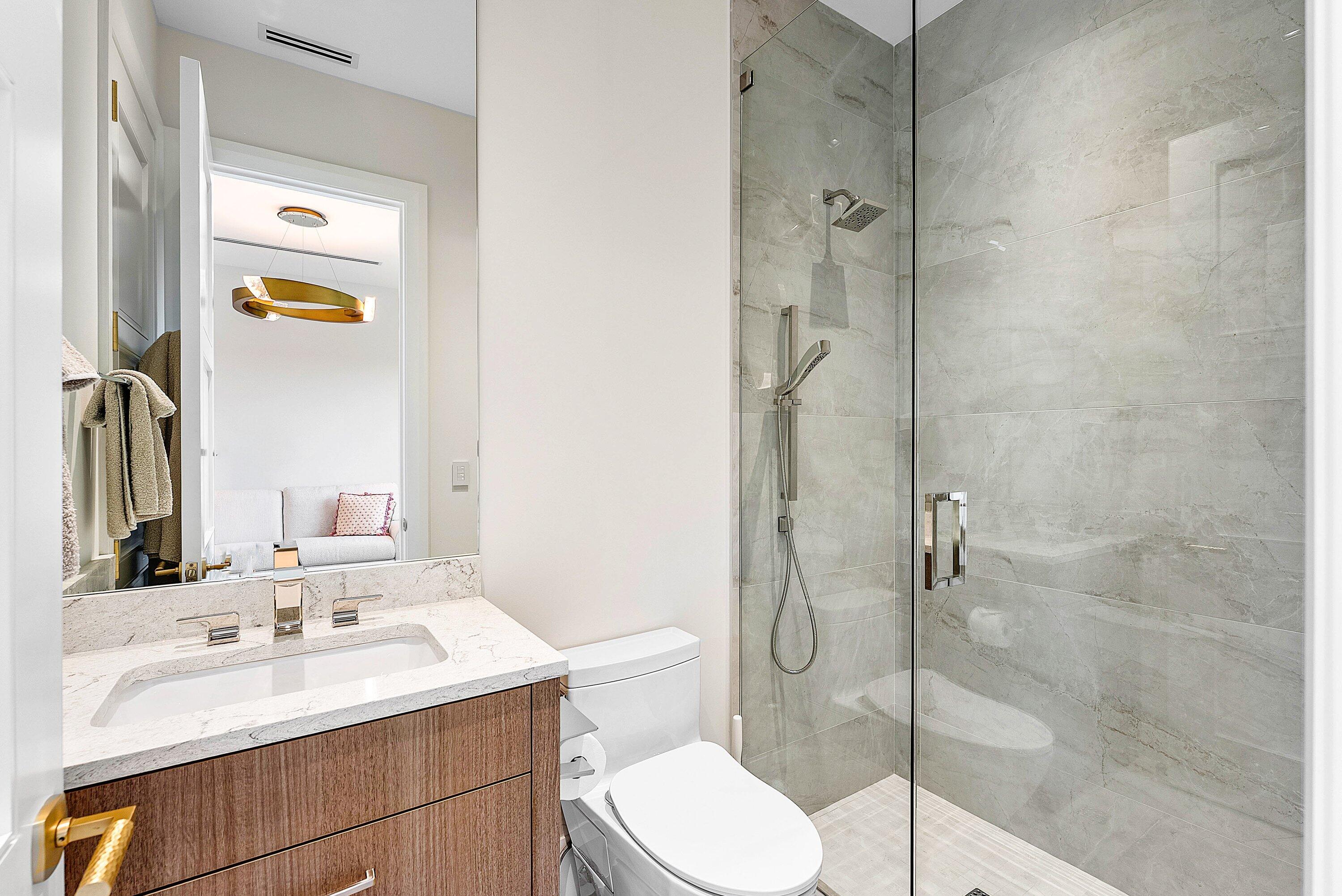 17615 Foxborough Lane Boca Raton, FL 33496 - Photo 48 of 120 a bathroom with a sink toilet and shower