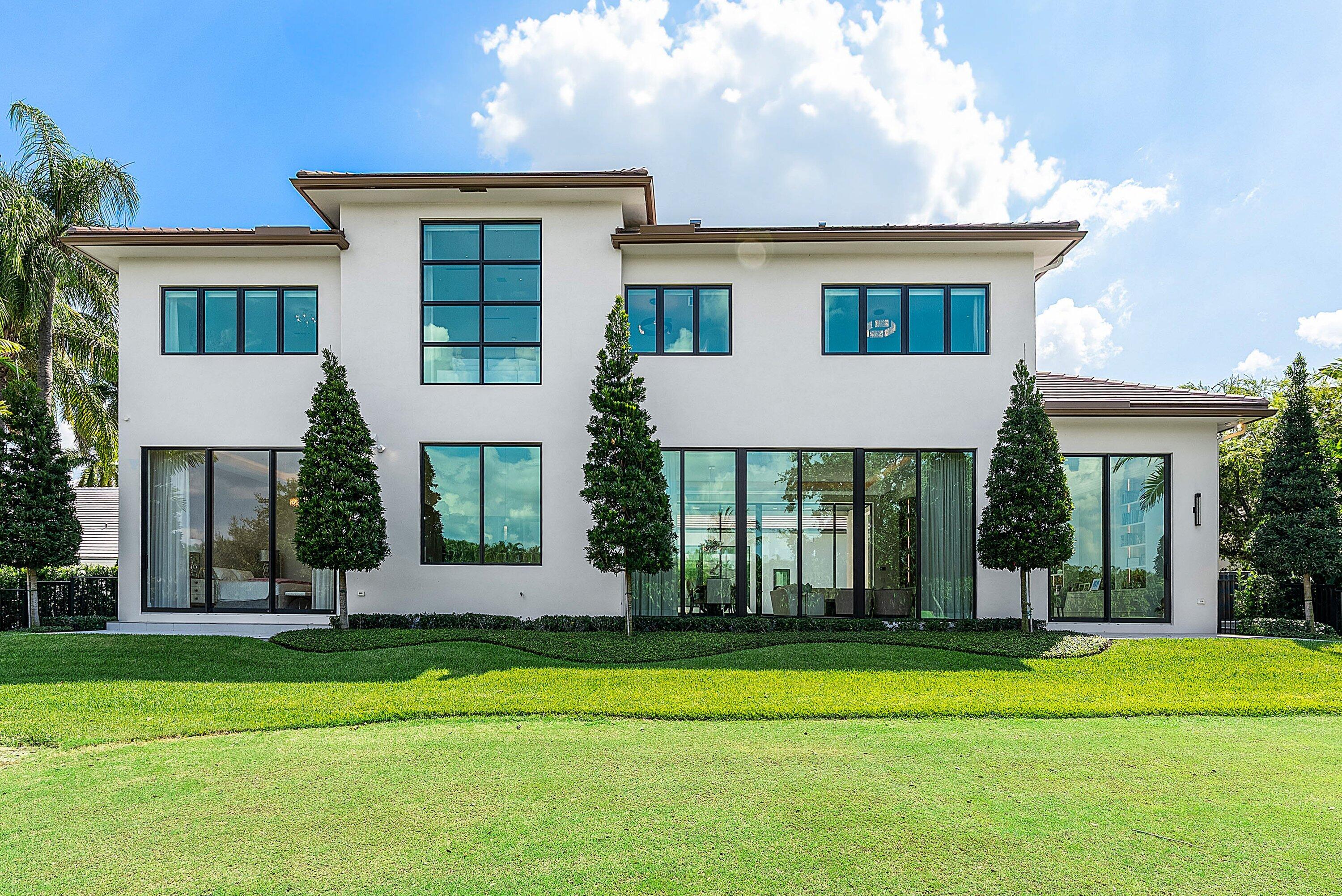 17615 Foxborough Lane Boca Raton, FL 33496 - Photo 55 of 120 front view of a house with a yard