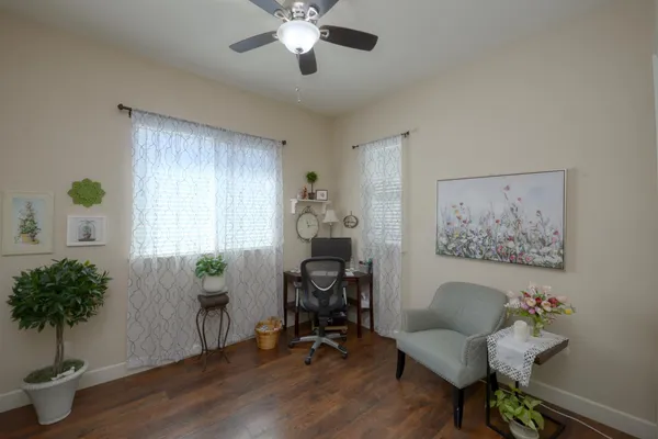 a workspace with furniture and a window