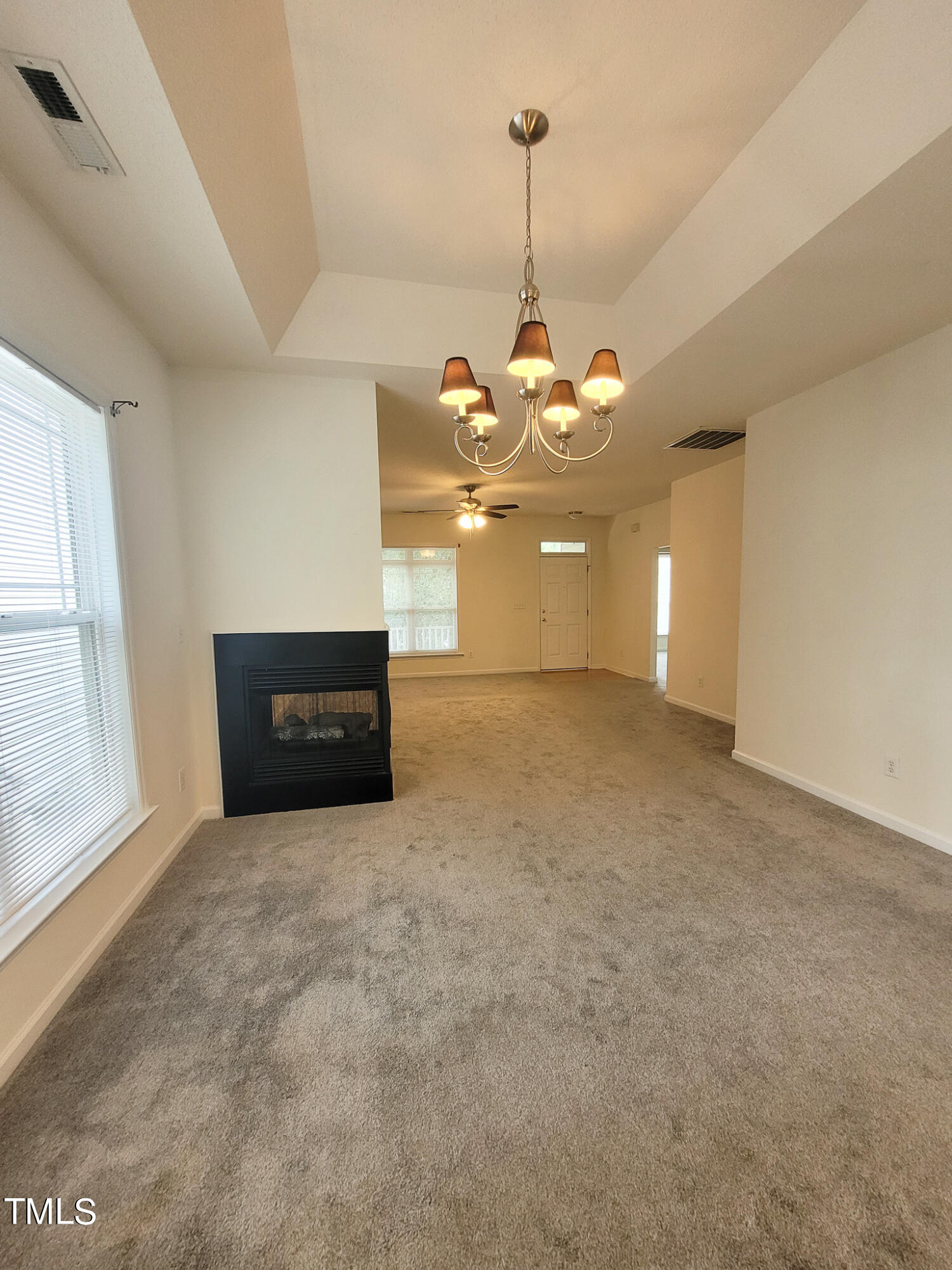 2349 Sapphire Valley Drive Raleigh, NC 27604 - Photo 13 of 46 a view of a big room with windows