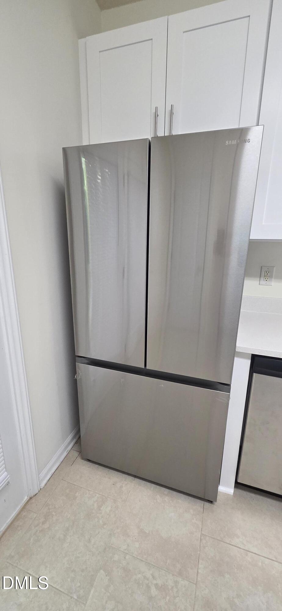 2349 Sapphire Valley Drive Raleigh, NC 27604 - Photo 20 of 46 a white refrigerator freezer sitting in a kitchen