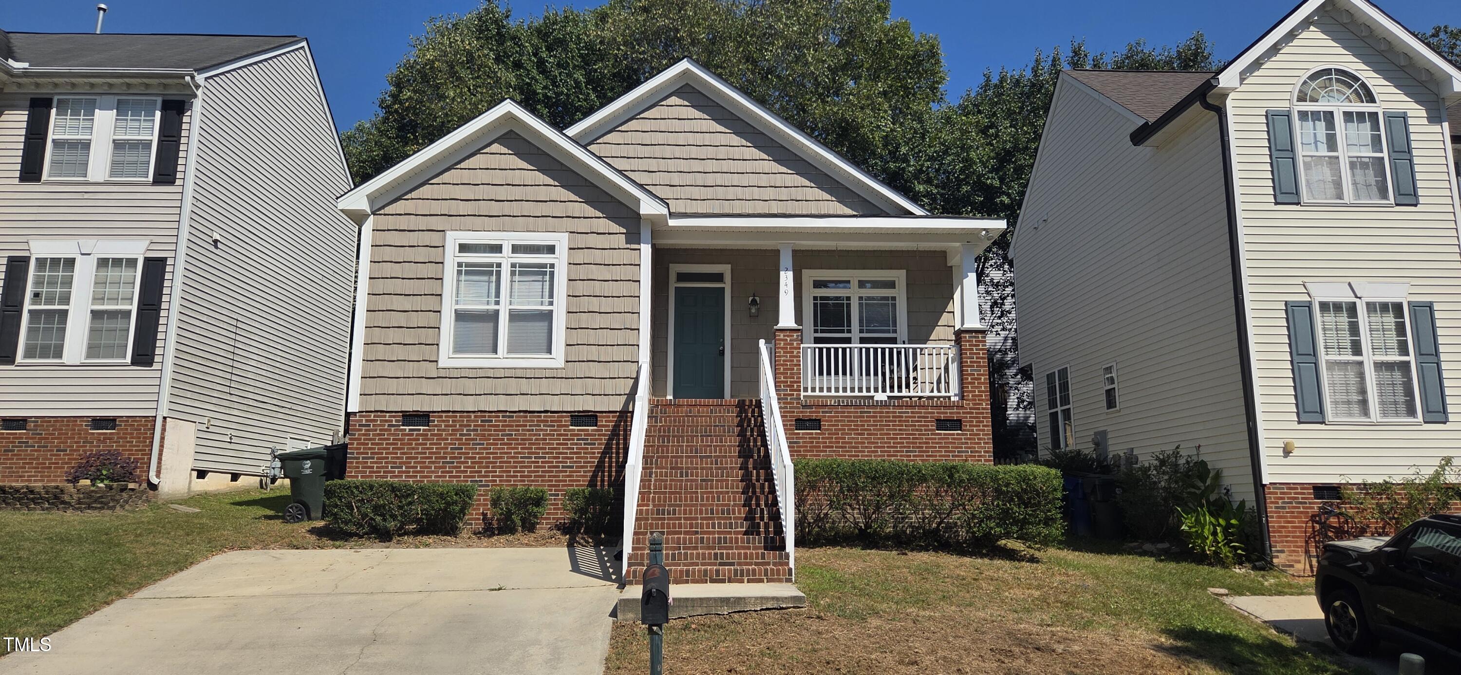 2349 Sapphire Valley Drive Raleigh, NC 27604 - Photo 2 of 46 a front view of a house with a yard