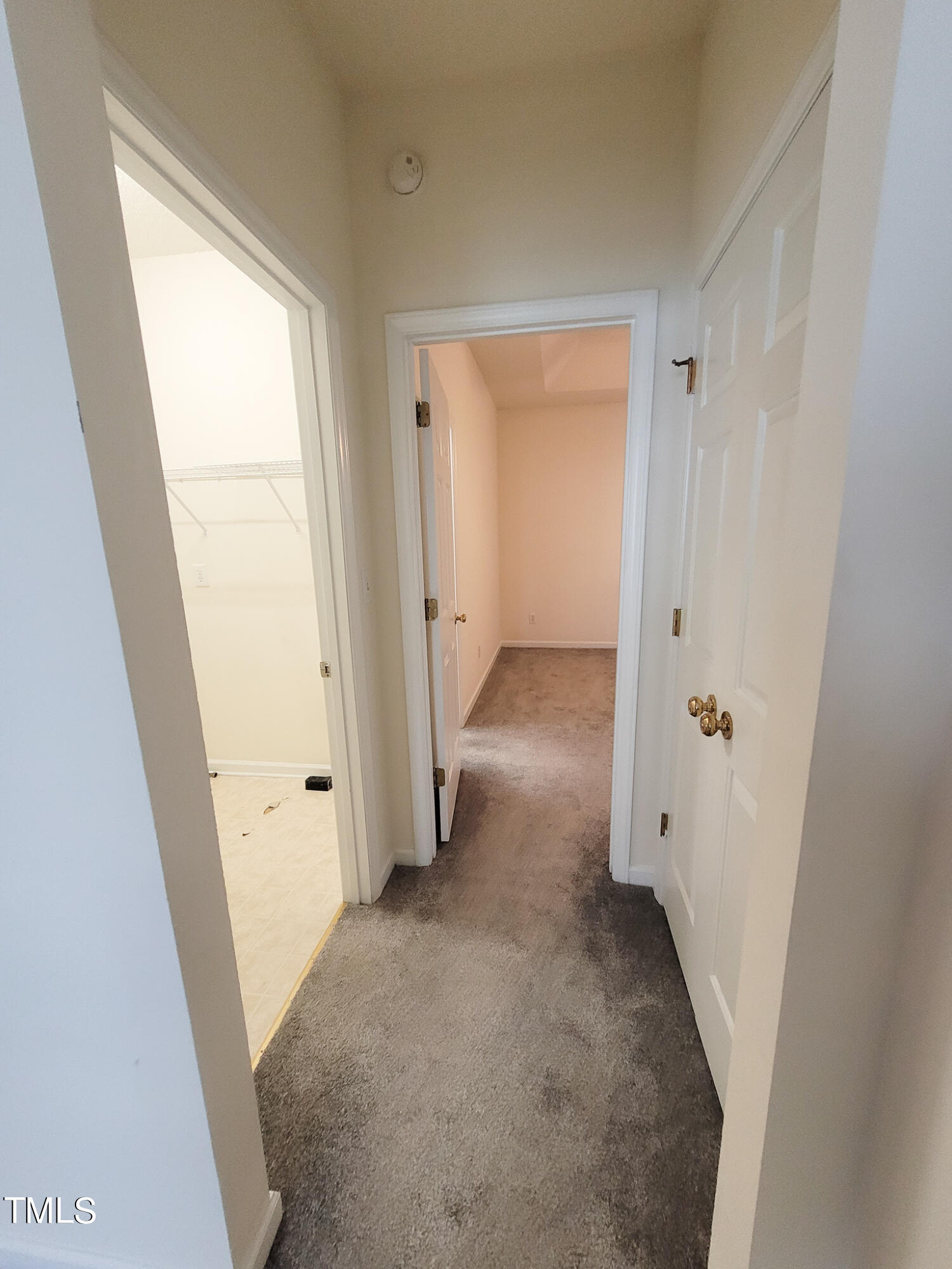 2349 Sapphire Valley Drive Raleigh, NC 27604 - Photo 21 of 46 a view of a hallway with wooden floor