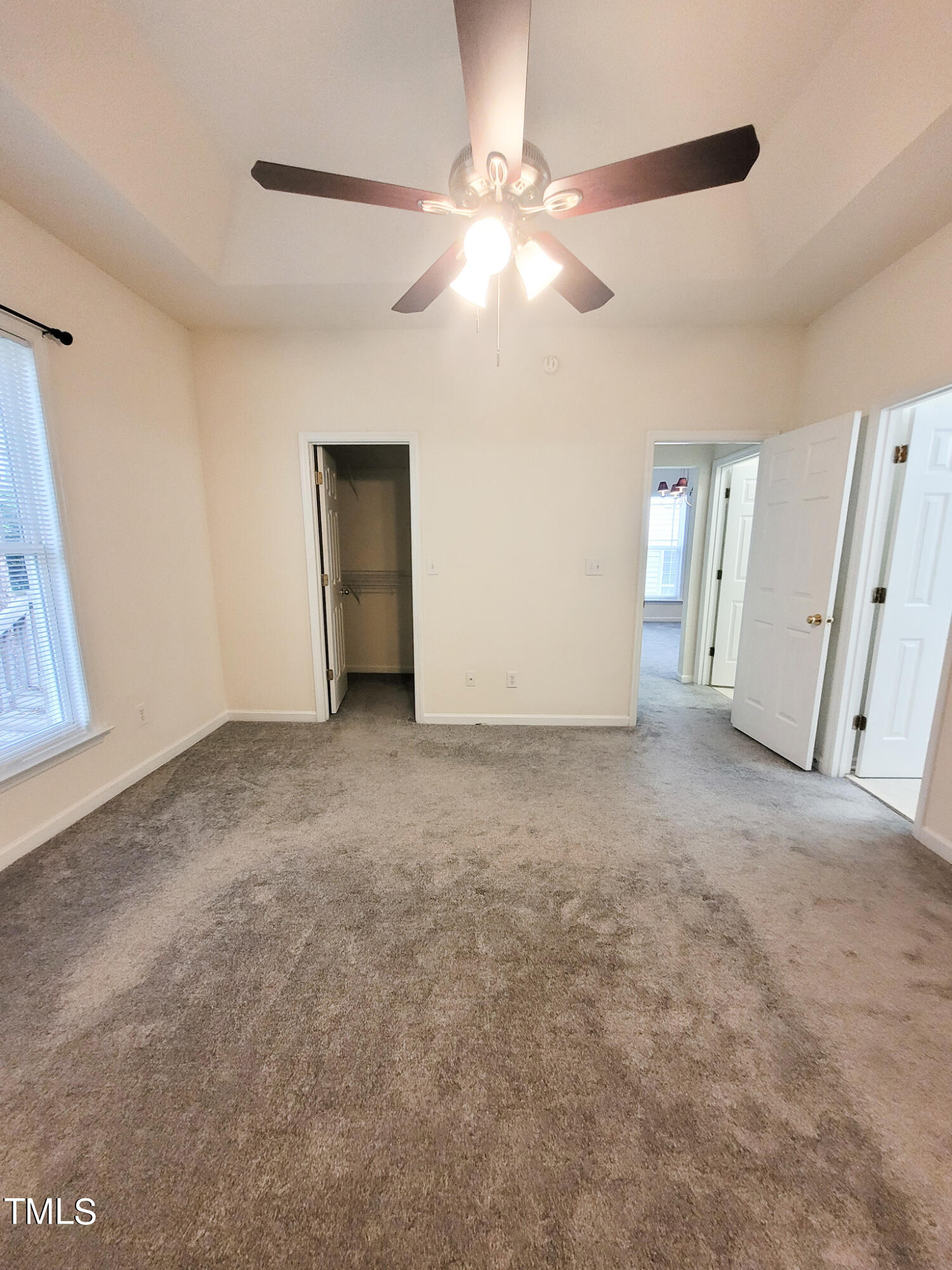 2349 Sapphire Valley Drive Raleigh, NC 27604 - Photo 25 of 46 a view of a livingroom with a ceiling fan and window
