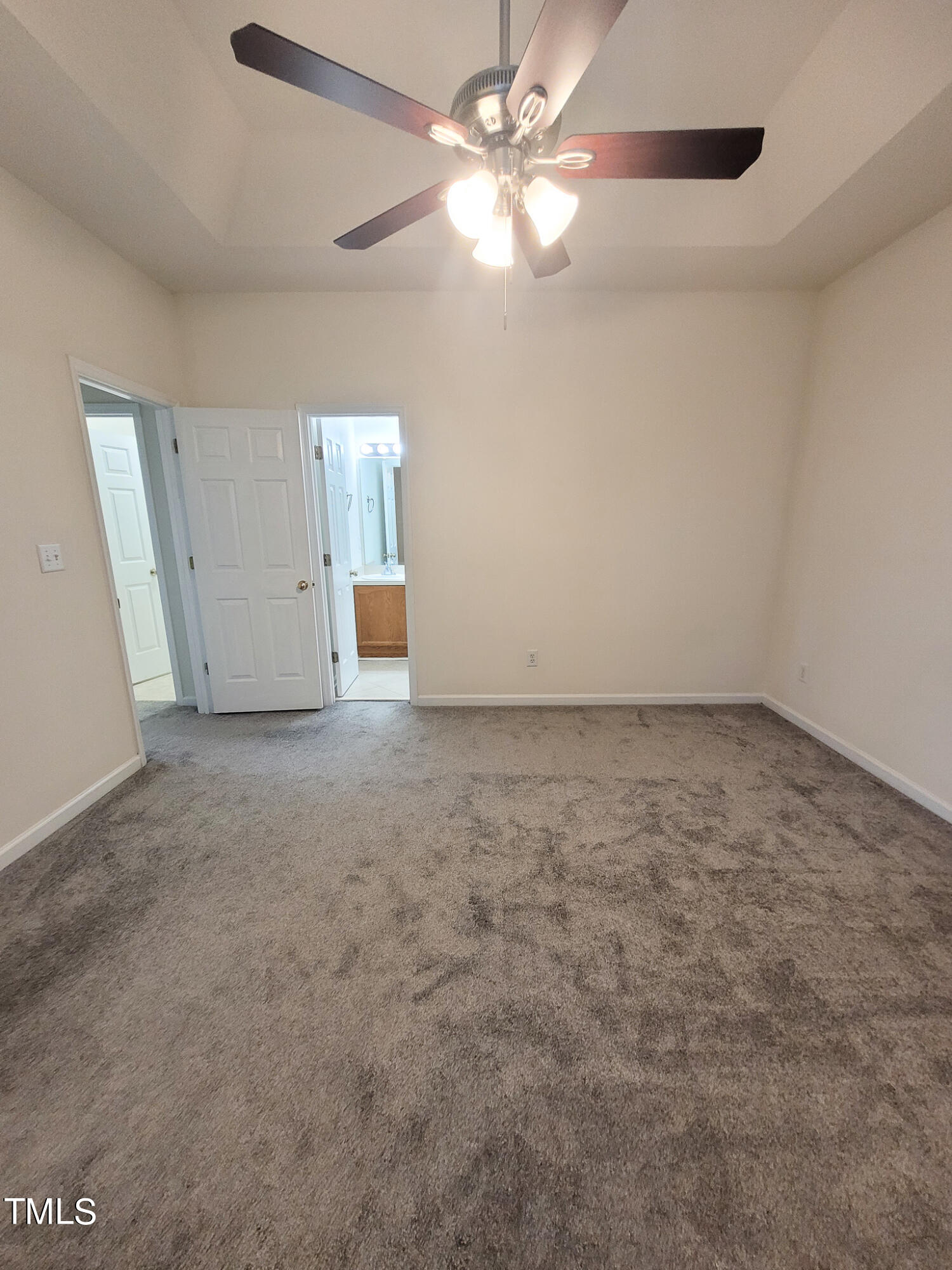 2349 Sapphire Valley Drive Raleigh, NC 27604 - Photo 26 of 46 an empty room with chandelier fan
