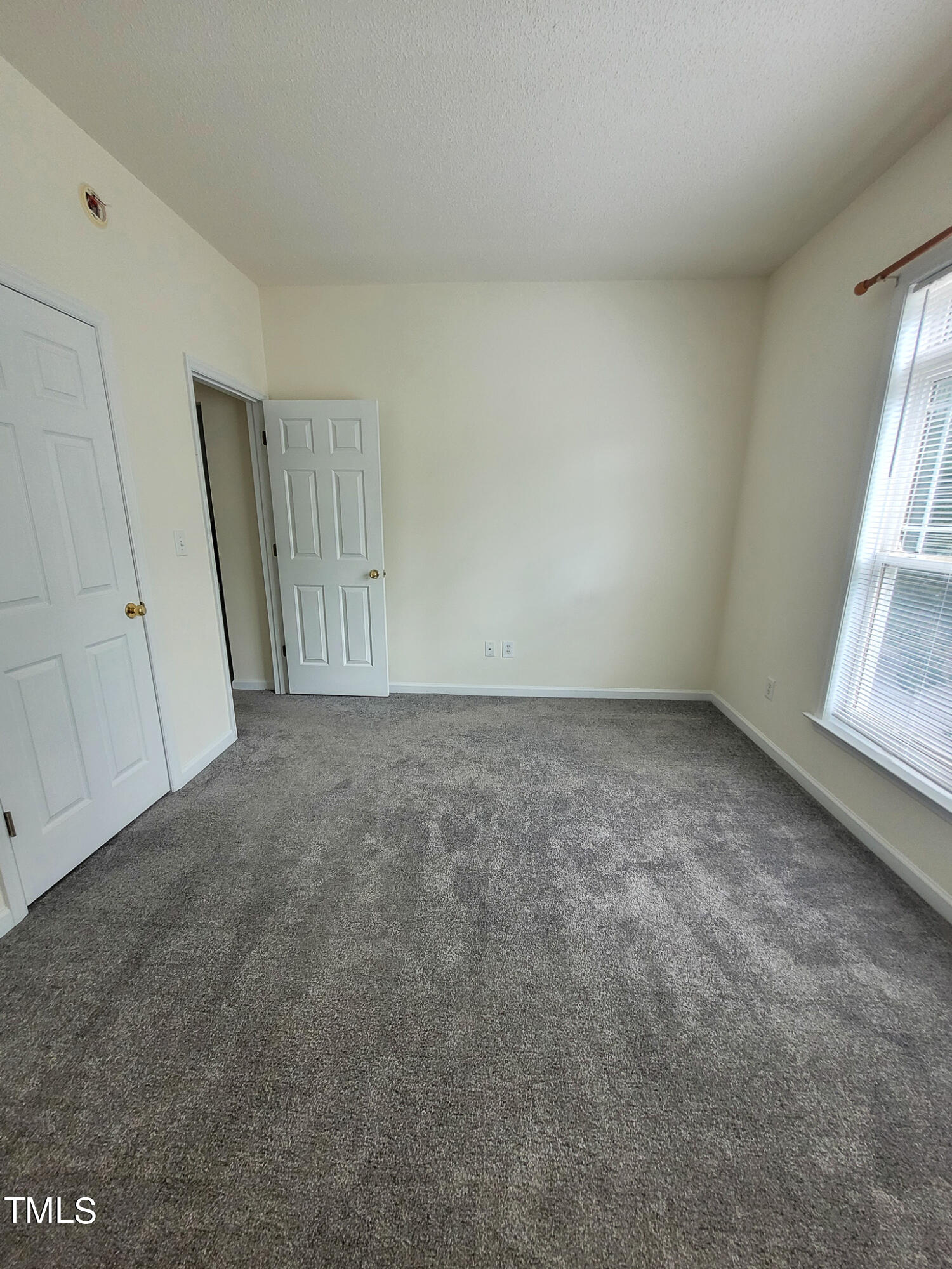 2349 Sapphire Valley Drive Raleigh, NC 27604 - Photo 36 of 46 a view of room with window and hardwood floor