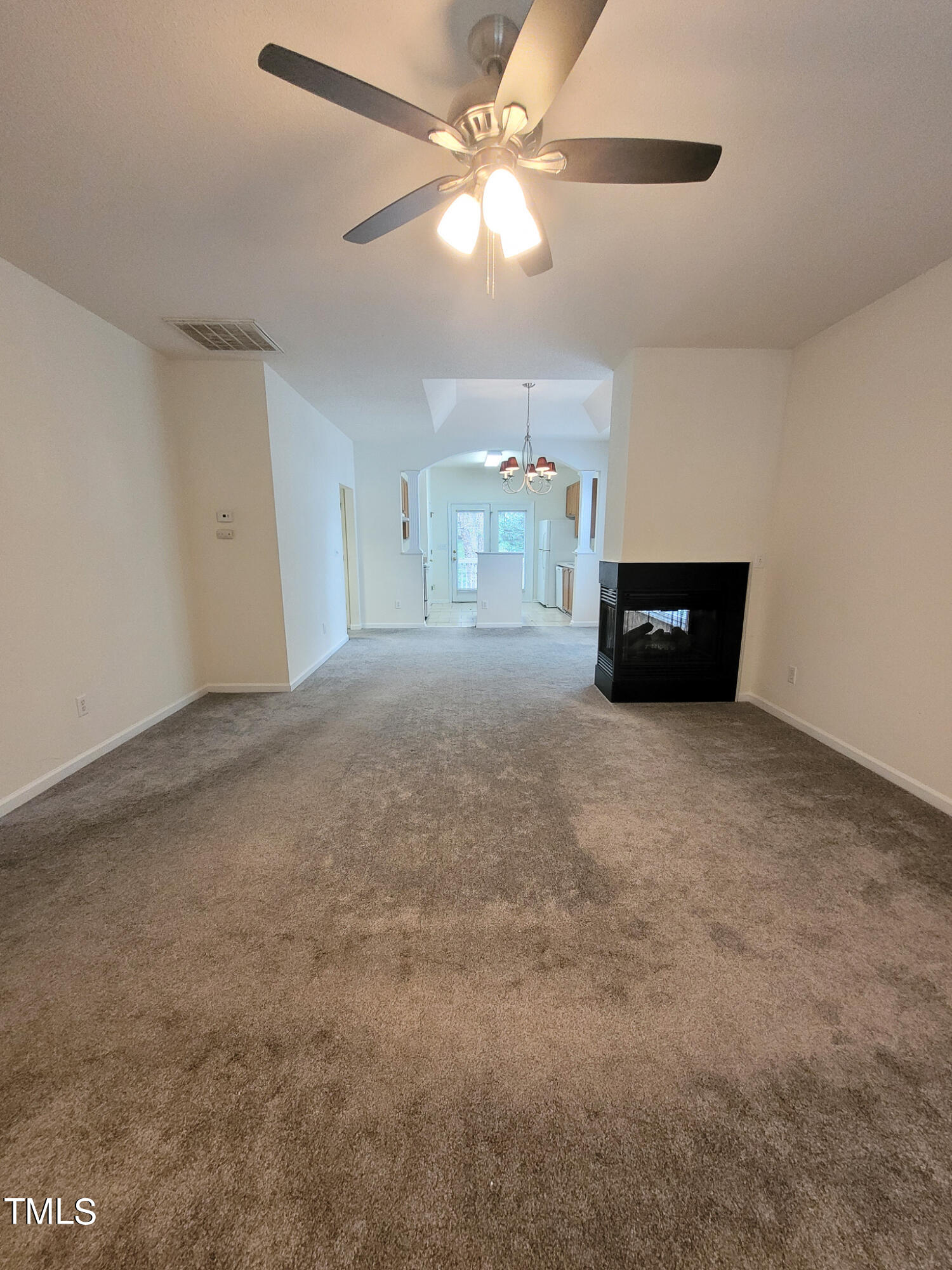 2349 Sapphire Valley Drive Raleigh, NC 27604 - Photo 8 of 46 a view of an empty room with a window