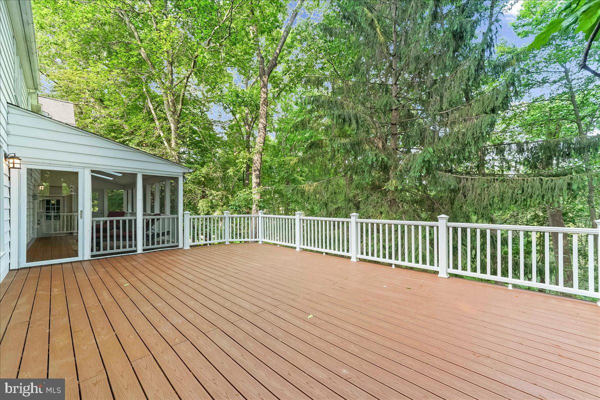 686 Limehouse Road Wayne, PA 19087 - Photo 20 of 51 a view of backyard with deck and wooden floor