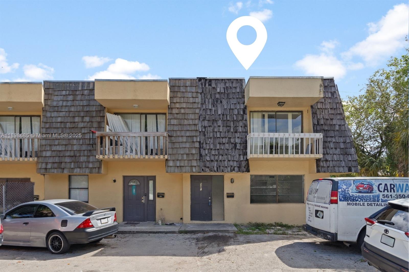 a car parked in front of a building