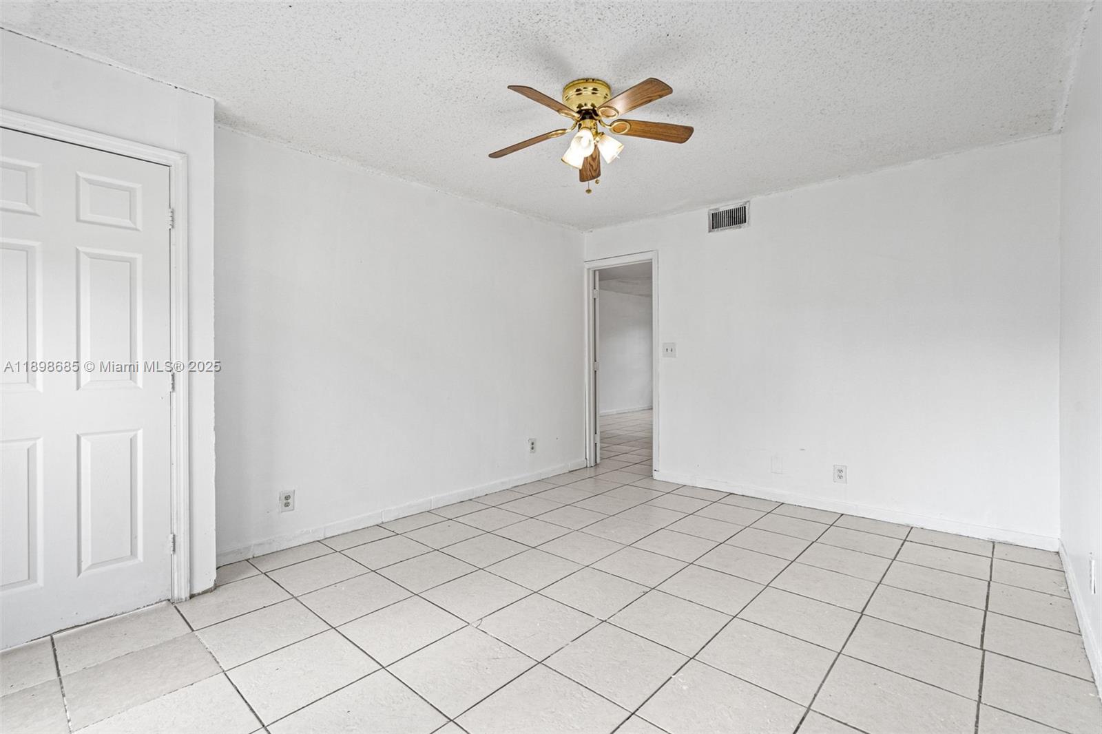 941 Southwest 20th Court Delray Beach, FL 33445 - Photo 14 of 46 a view of an empty room