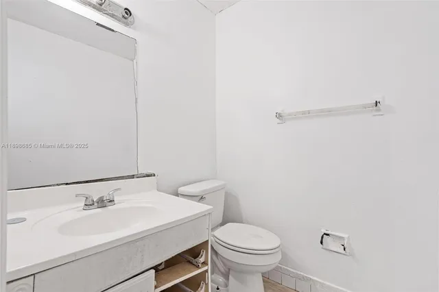 a bathroom with a sink and a toilet