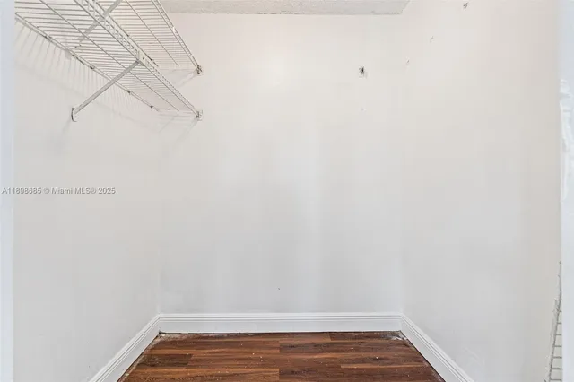 a view of a room with racks on the wall