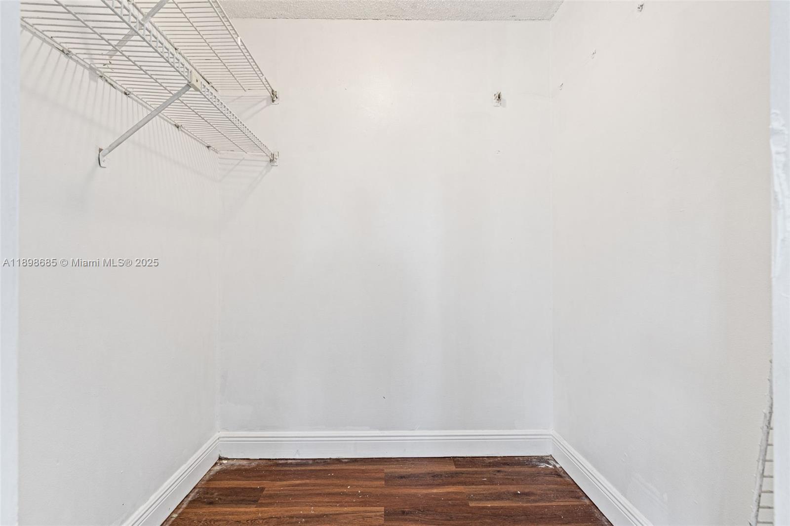 941 Southwest 20th Court Delray Beach, FL 33445 - Photo 23 of 46 a view of a room with racks on the wall