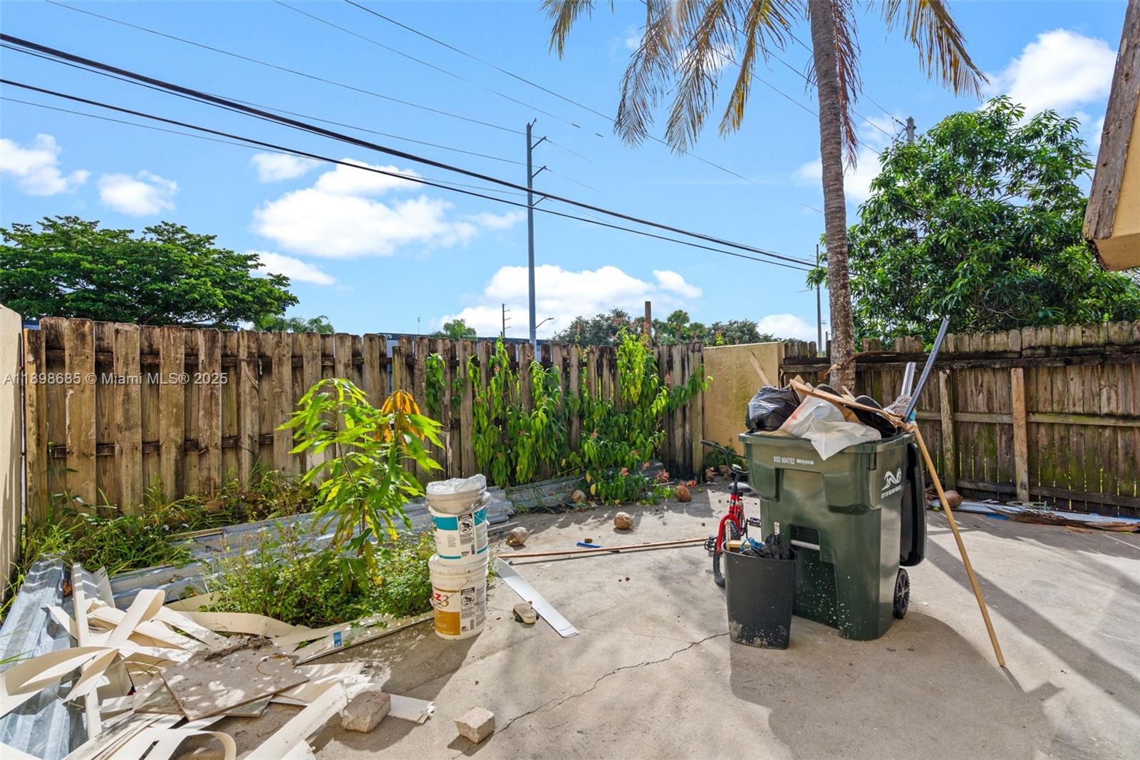 941 Southwest 20th Court Delray Beach, FL 33445 - Photo 34 of 46 a view of a backyard with plants and outdoor seating