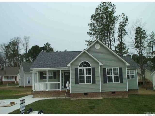 7136 Spanglers Spring Way Raleigh, NC 27610 - Photo 1 of 1 a view of house with a yard