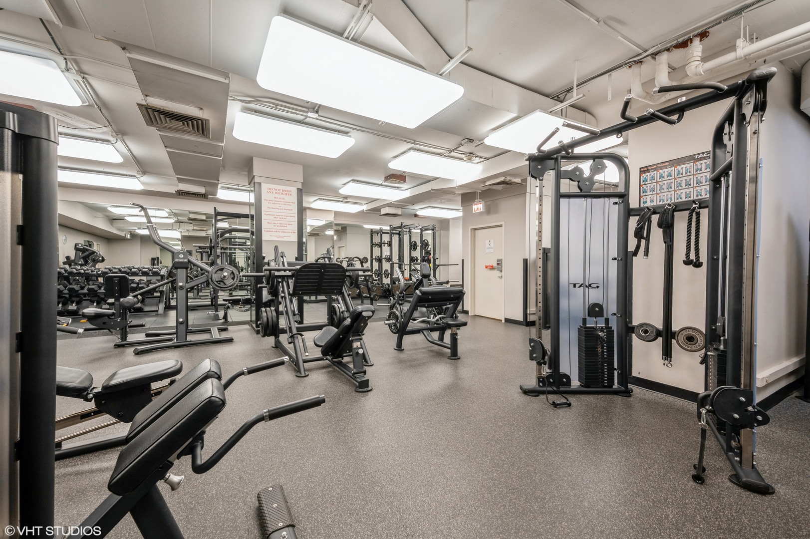 211 East Ohio Street, Unit 723 Chicago, IL 60611 - Photo 14 of 14 a view of a room with gym equipment