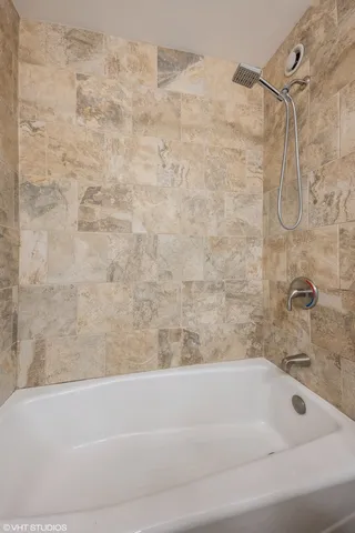 a bathroom with a bathtub