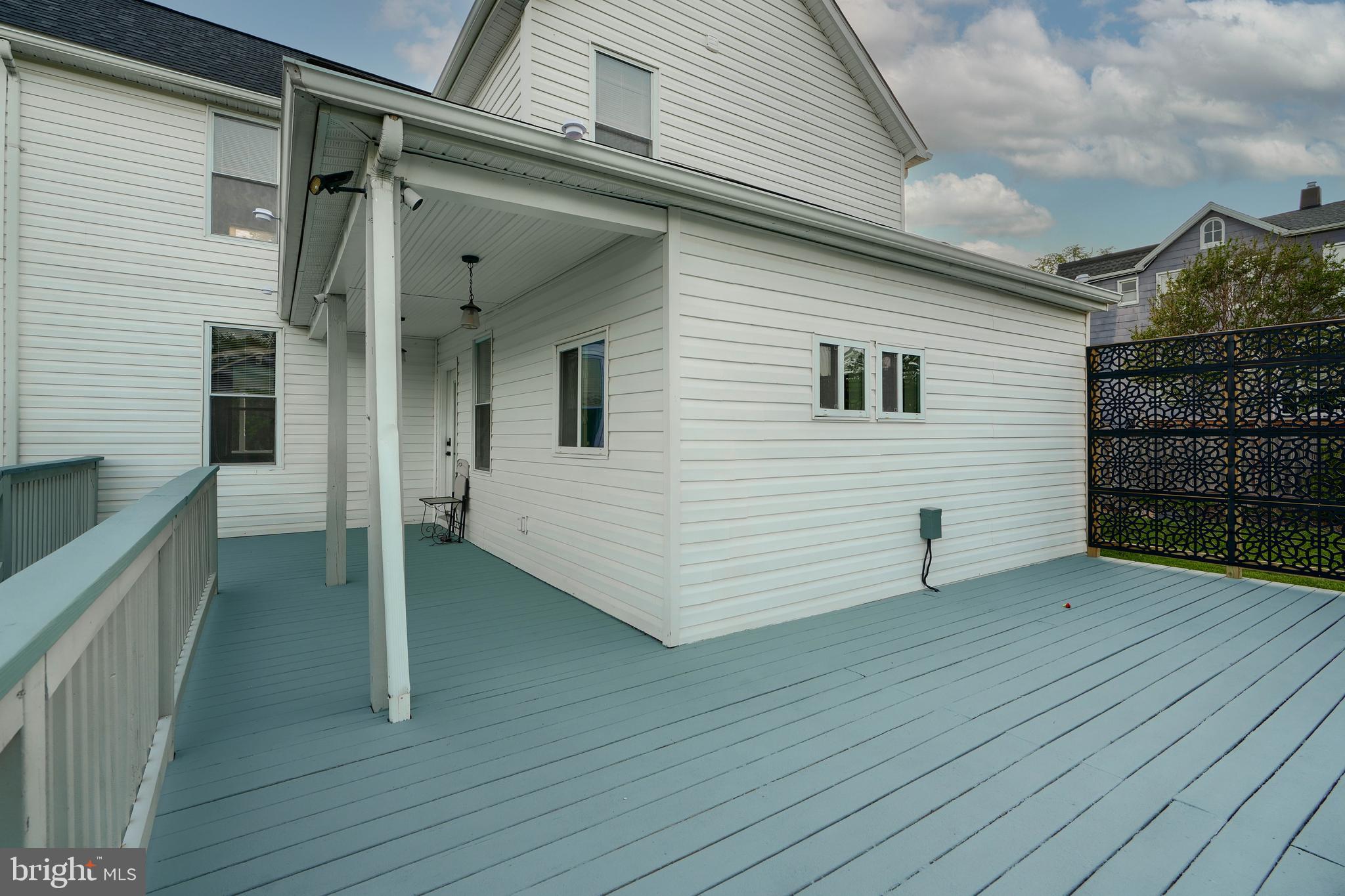 1817 Summit Avenue Baltimore, MD 21227 - Photo 19 of 28 a view of a house with a backyard