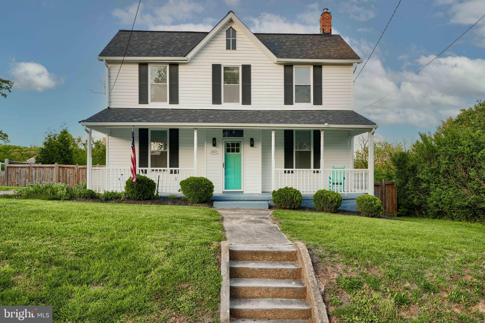 1817 Summit Avenue Baltimore, MD 21227 - Photo 28 of 28 a front view of a house with garden