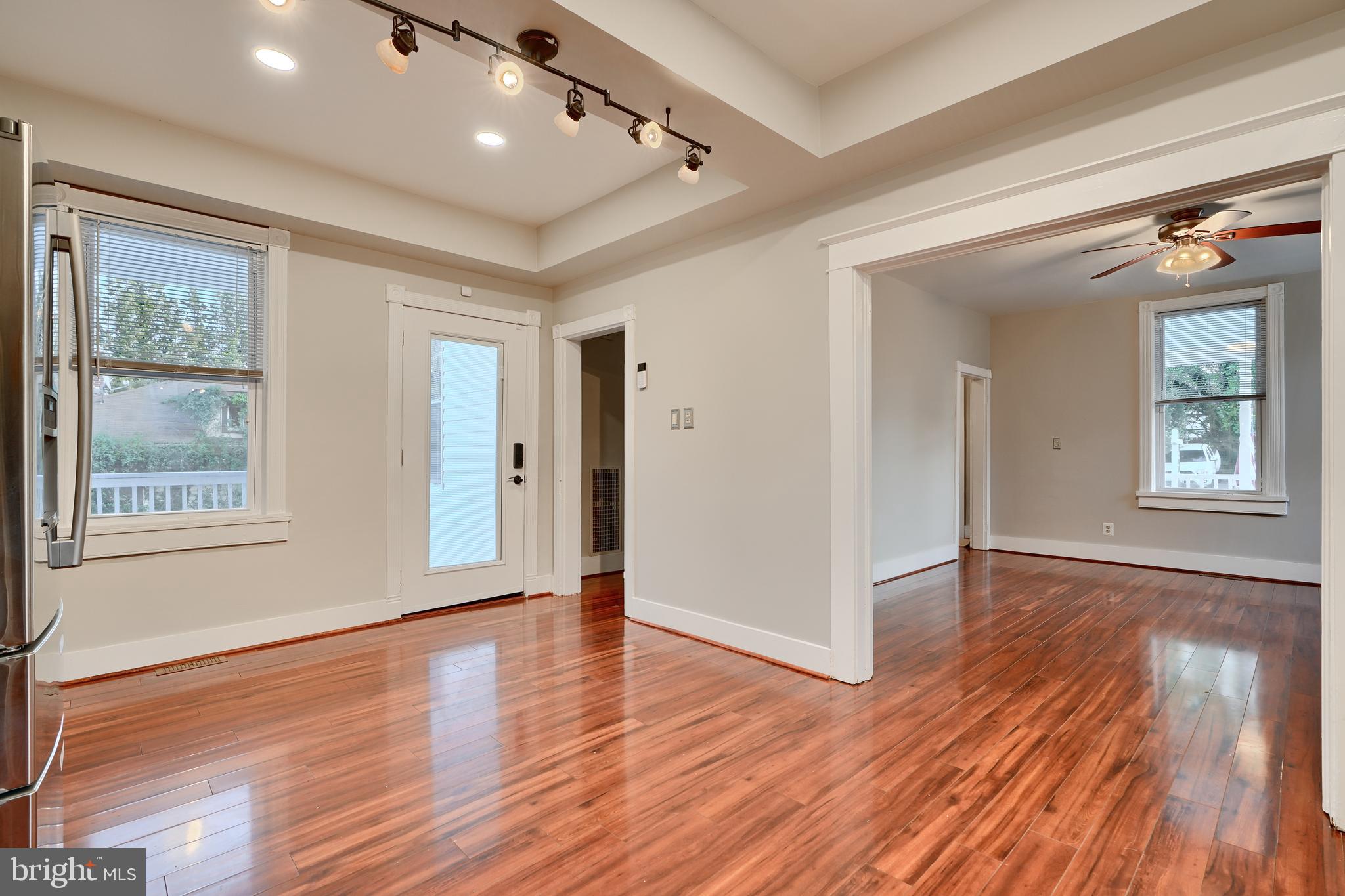 1817 Summit Avenue Baltimore, MD 21227 - Photo 4 of 28 a view of livingroom with hardwood floor and hallway