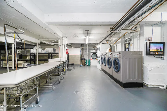 a storage room with washer and dryer