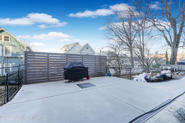 a view of a car parked in front of house