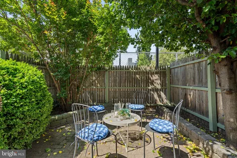 a view of a table and chairs in patio