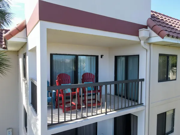 a view of a city with lush green forest