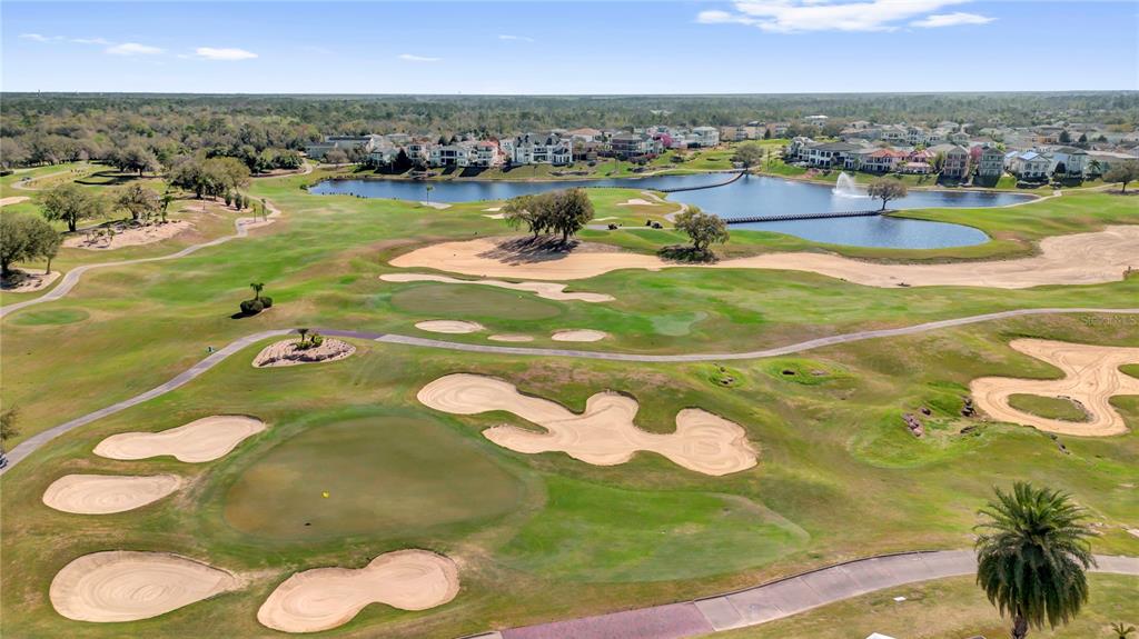 7809 Loxahatchee Court Reunion, FL 34747 - Photo 5 of 14 a view of a swimming pool with a lot of flower in it