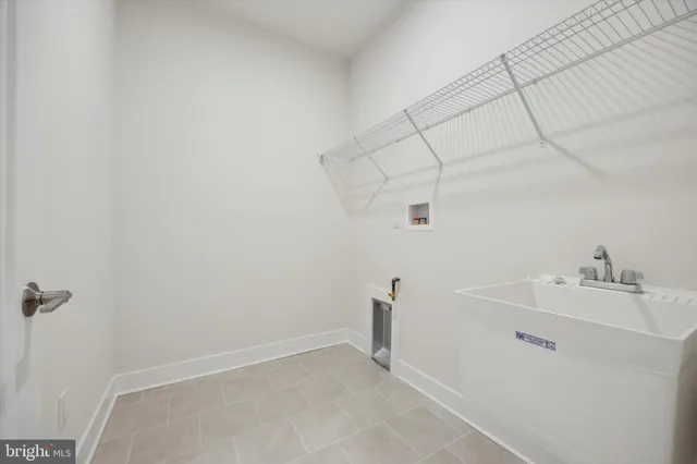 a view of a room with racks on the wall