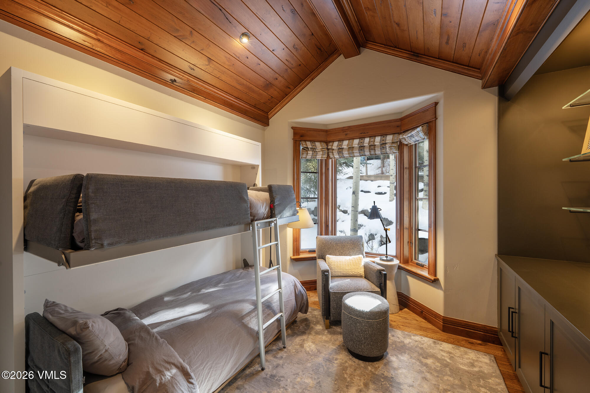 325 West Forest Road Vail, CO 81657 - Photo 25 of 33 a living room with furniture and a window