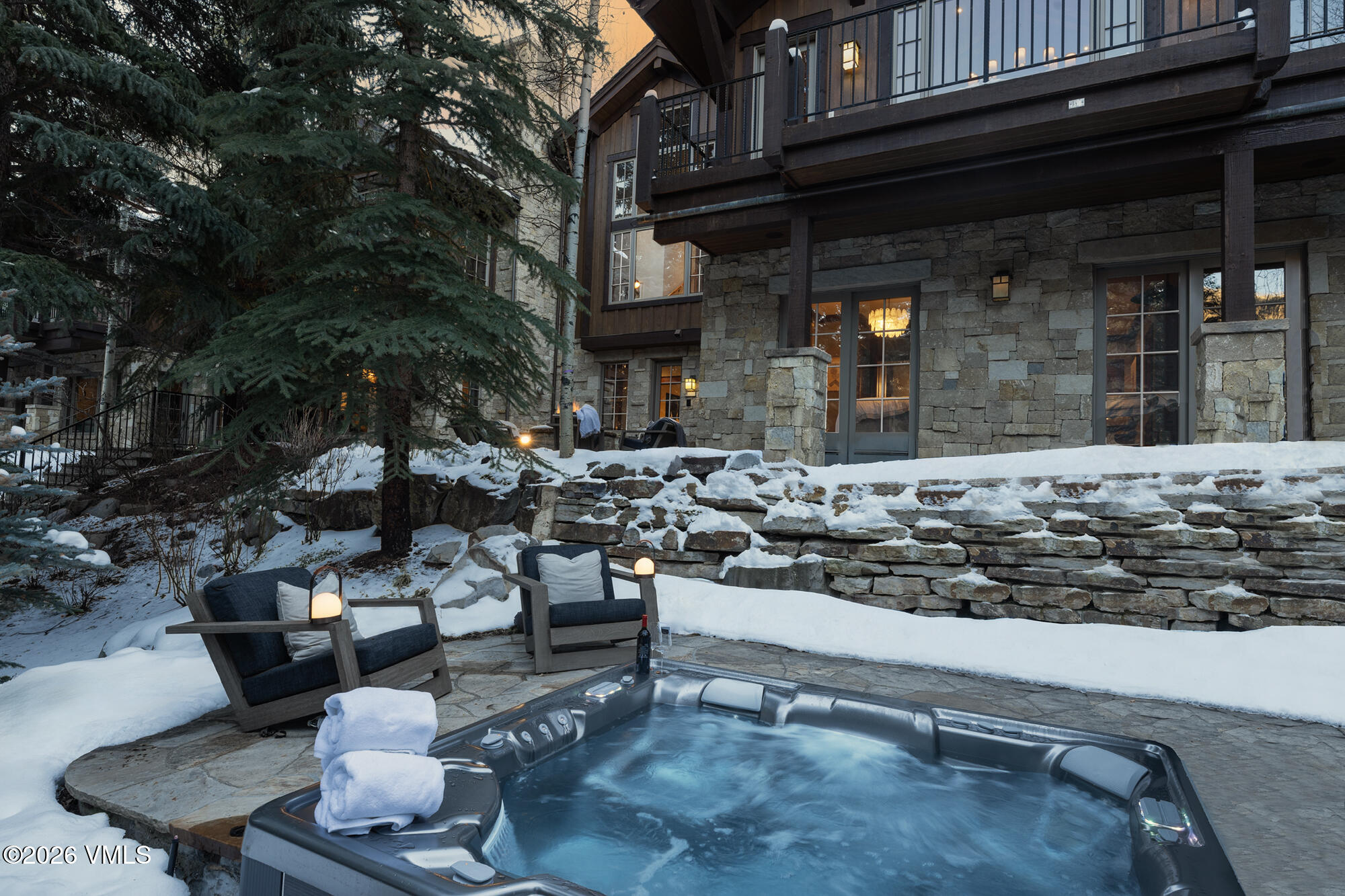 325 West Forest Road Vail, CO 81657 - Photo 30 of 33 a view of a patio with couches and table and chairs